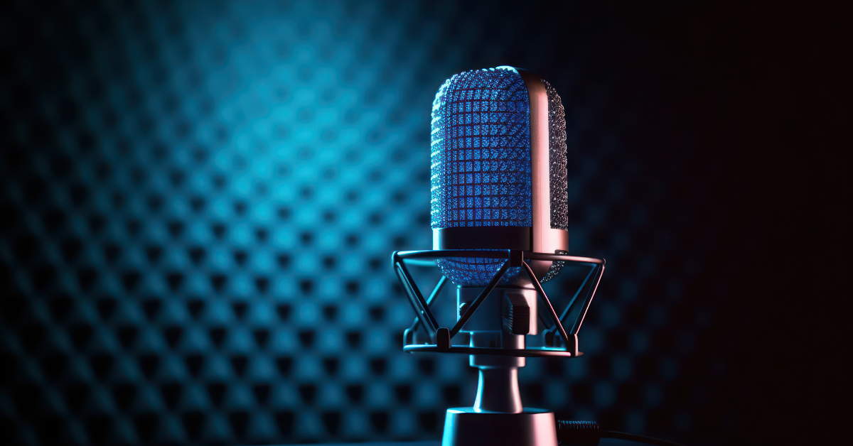 How To Start A Podcast: modern podcast studio setup featuring a microphone, headphones, and a laptop, surrounded by soundproofing panels.